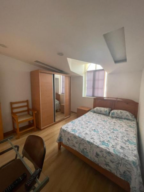 Quarto em Praia